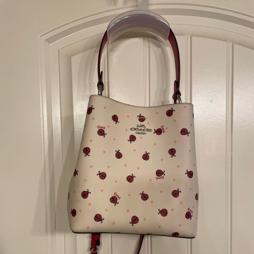 Coach Cream and Red Ladybug Bucket Bag